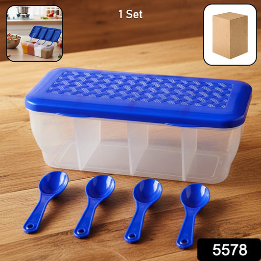 Clear 4-section container filled with various Indian spices and dry fruits.