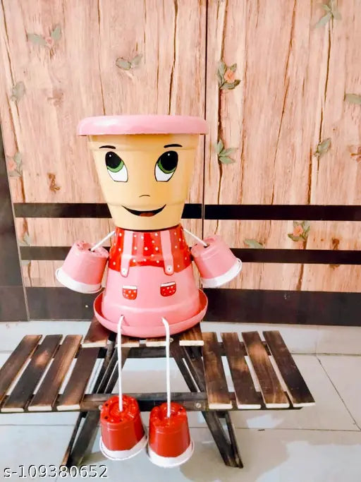 Wonderful Flower Pots With Cute Pink Baby Girl Design Printed For Decoration